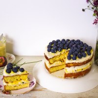 Vanilla Sponge Cake with Passionfruit Curd, Whipped Cream and Fresh Blueberries